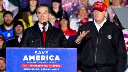 Pennsylvania Senate candidate Mehmet Oz, accompanied by former President Donald Trump, speaks at a campaign rally in Greensburg, Pa., on May 6, 2022. 