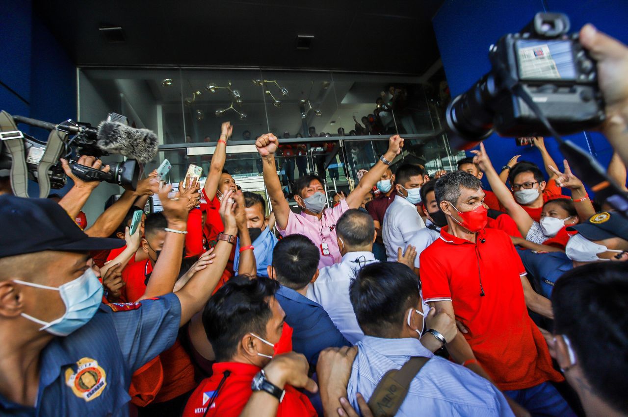 Ferdinand "Bongbong" Marcos Jr., the presumptive President of the Philippines, greets supporters at his campaign headquarters in Mandaluyong, Philippines, on Wednesday, May 11. <a href="https://www.cnn.com/2022/05/11/asia/marcos-philippines-president-explainer-intl-hnk/index.html" target="_blank">He won Monday's elections in a landslide,</a> according to unofficial results.