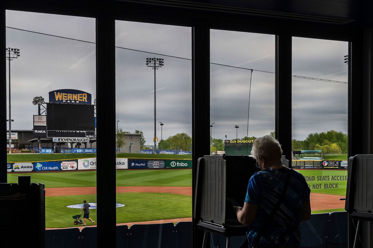 Carol Szczepaniak votes in Nebraska's primary election from a polling location at Werner Park in Papillion on Tuesday, May 10. The baseball park is home to the Omaha Storm Chasers.