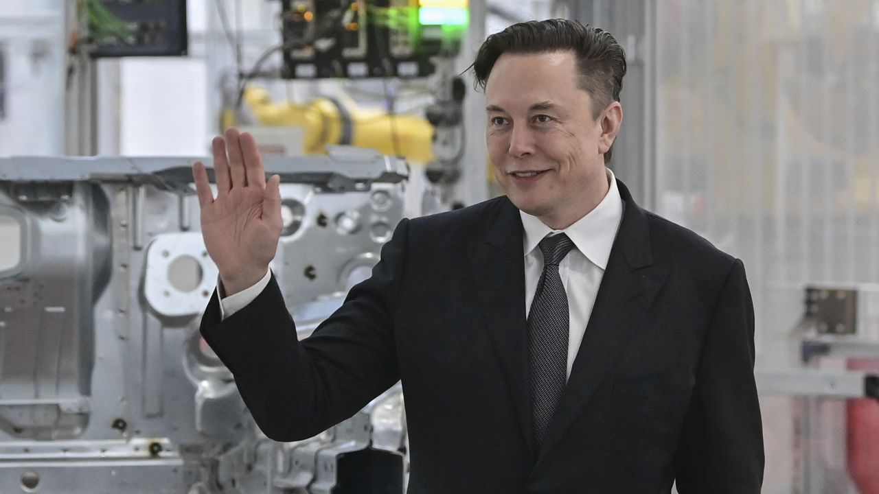 FILE - Tesla CEO Elon Musk attends the opening of the Tesla factory Berlin Brandenburg in Gruenheide, Germany, Tuesday, March 22, 2022. Shares of Tesla and Twitter have tumbled this week as investors deal with the fallout and potential legal issues surrounding Tesla CEO Musk and his $44 billion bid to buy the social media platform. Of the two, Musk's electric vehicle company has fared worse, with its stock down almost 16% so far this week to $728. (Patrick Pleul/Pool via AP, File)