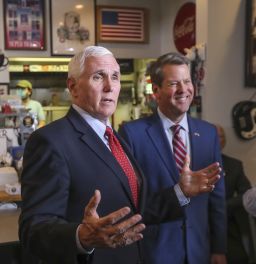 Vice President Mike Pence, left, speaks as Georgia Gov. Brian Kemp, right, listens at the Star Cafe in Atlanta, Friday, May 22, 2020, during the coronavirus pandemic. (John Spink/Atlanta Journal-Constitution via AP)