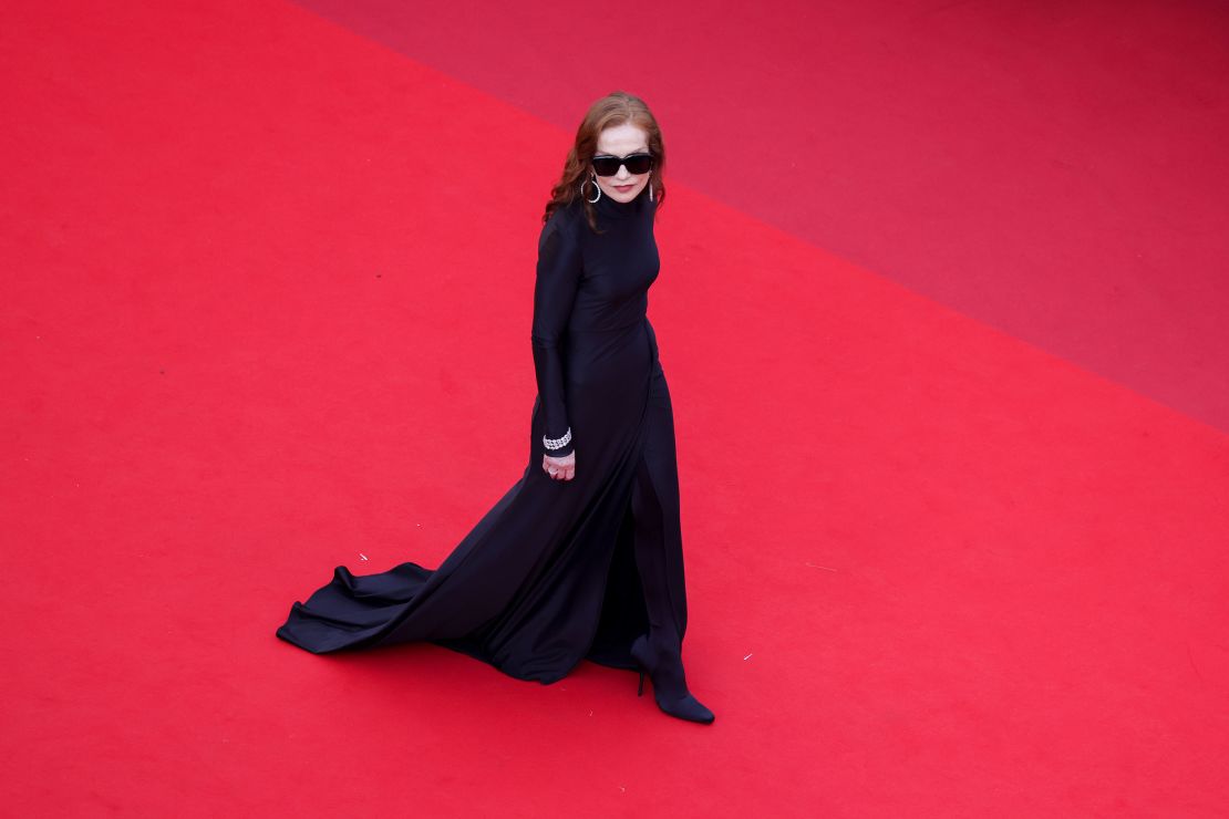 Isabelle Huppert's sleek, all-black Balenciaga look for the 2021 premiere of "Everything Went Fine" was a masterclass in sophisticated glamour.