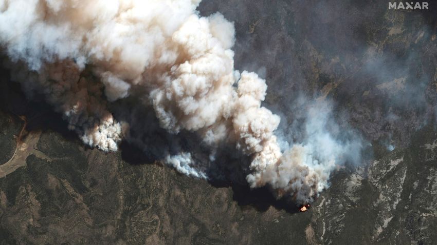 A satellite image shows a natural color view of active fire lines from the Hermits Peak and Calf Canyon fires, near Las Vegas, New Mexico, U.S., May 11, 2022.