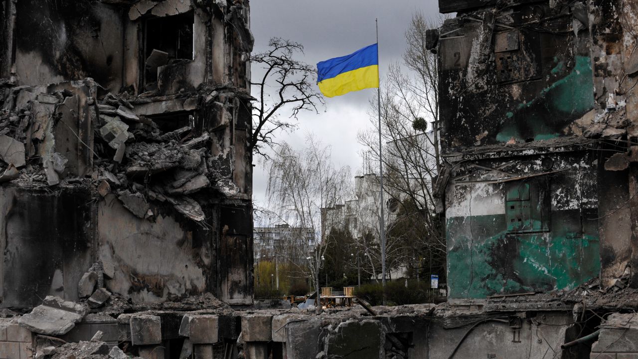 A Ukrainian flag flies in a damaged residential area in the city of Borodianka, northwest of the Ukrainian capital Kyiv.