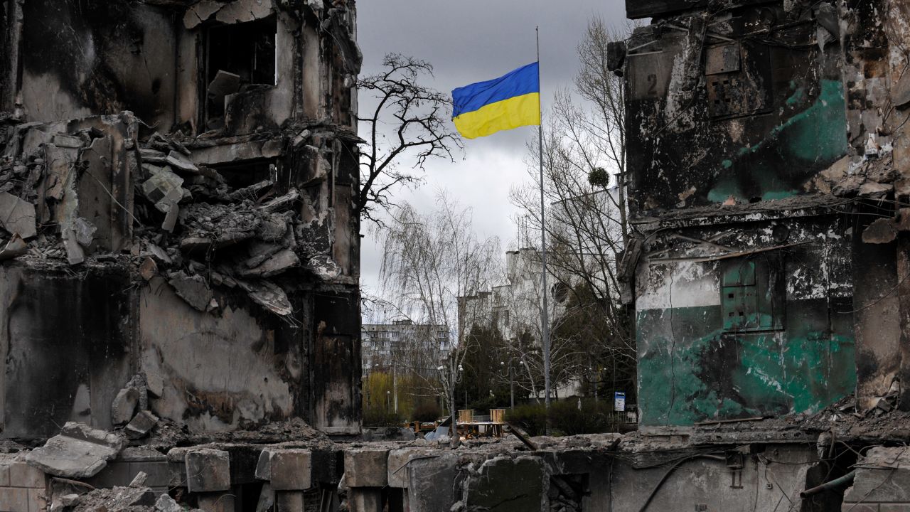 A Ukrainian flag flies in a damaged residential area in the city of Borodianka, northwest of the Ukrainian capital, Kyiv.