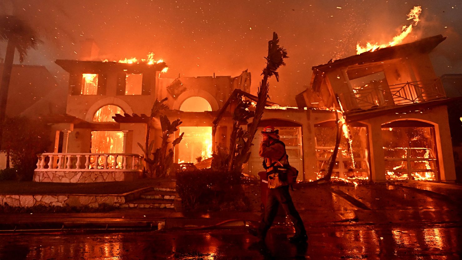 Firefighters battle a brush fire that grew quickly out of control in Laguna Niguel, California, on Wednesday.