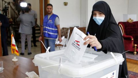 A Lebanese woman casts her ballot at a polling station at the Lebanese embassy in Tehran on May 6, 2022.