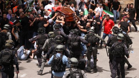 Family and friends carry the coffin of Al Jazeera reporter Shireen Abu Akleh, who was killed during an Israeli raid on Jenin in the occupied West Bank when clashes broke out with Israeli security forces during her funeral in Jerusalem on May 13.