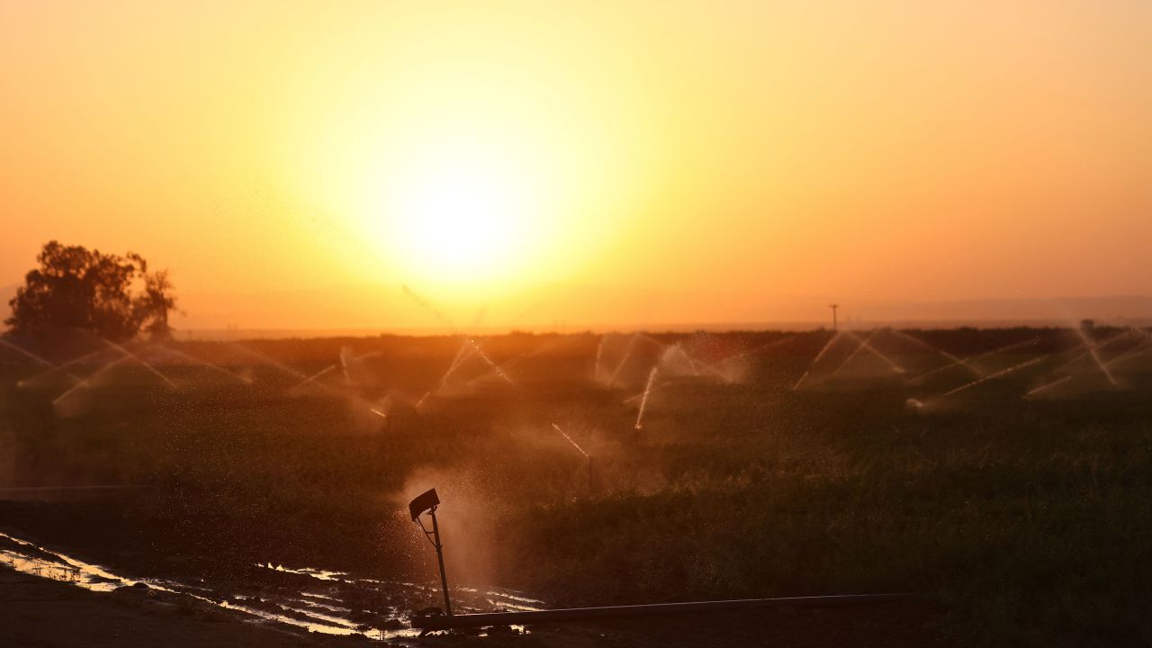 Sprinklers water fields in Kern County.