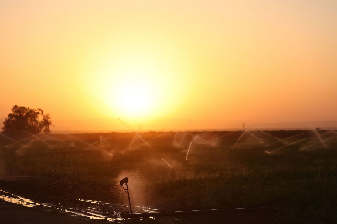 Sprinklers water fields in Kern County.