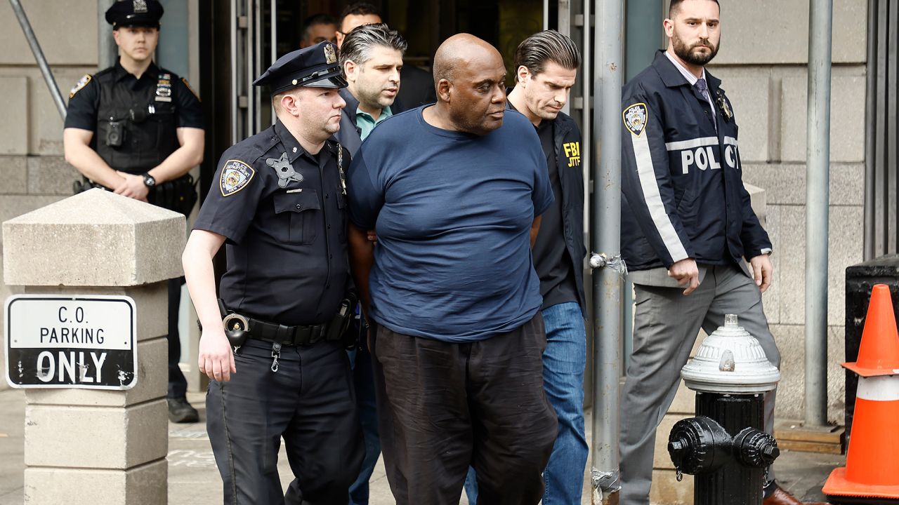 Suspected subway shooter, Frank James is escorted out by the FBI and NYPD officers from the 9th Precinct after being arrested in the attack at the 36th St subway  station in Brooklyn on April 13, 2020 in New York City.