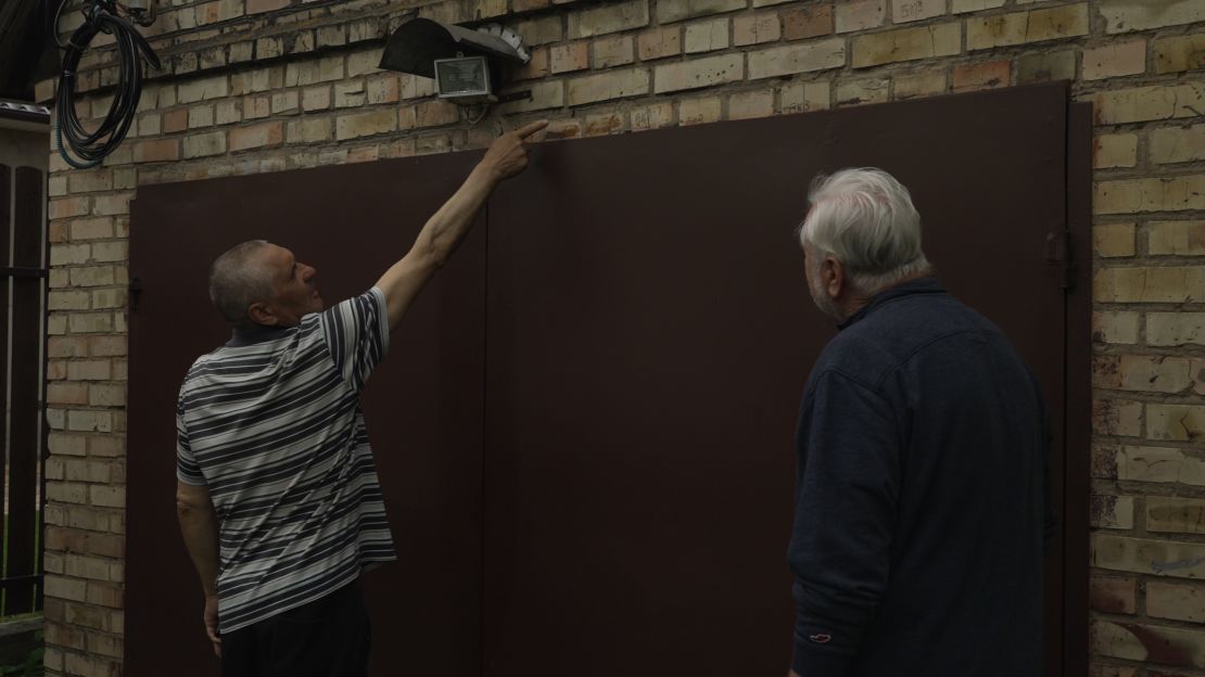 Hundreds of the metal darts are still embeded deep in the walls of Volodymyr Klimashevskyi's home in Irpin.