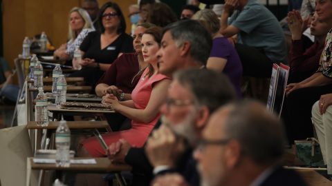 Sarah Absher, center in pink, is one of 28 primary candidates vying for nine positions on the Winston-Salem / Forsyth County Board of Education.