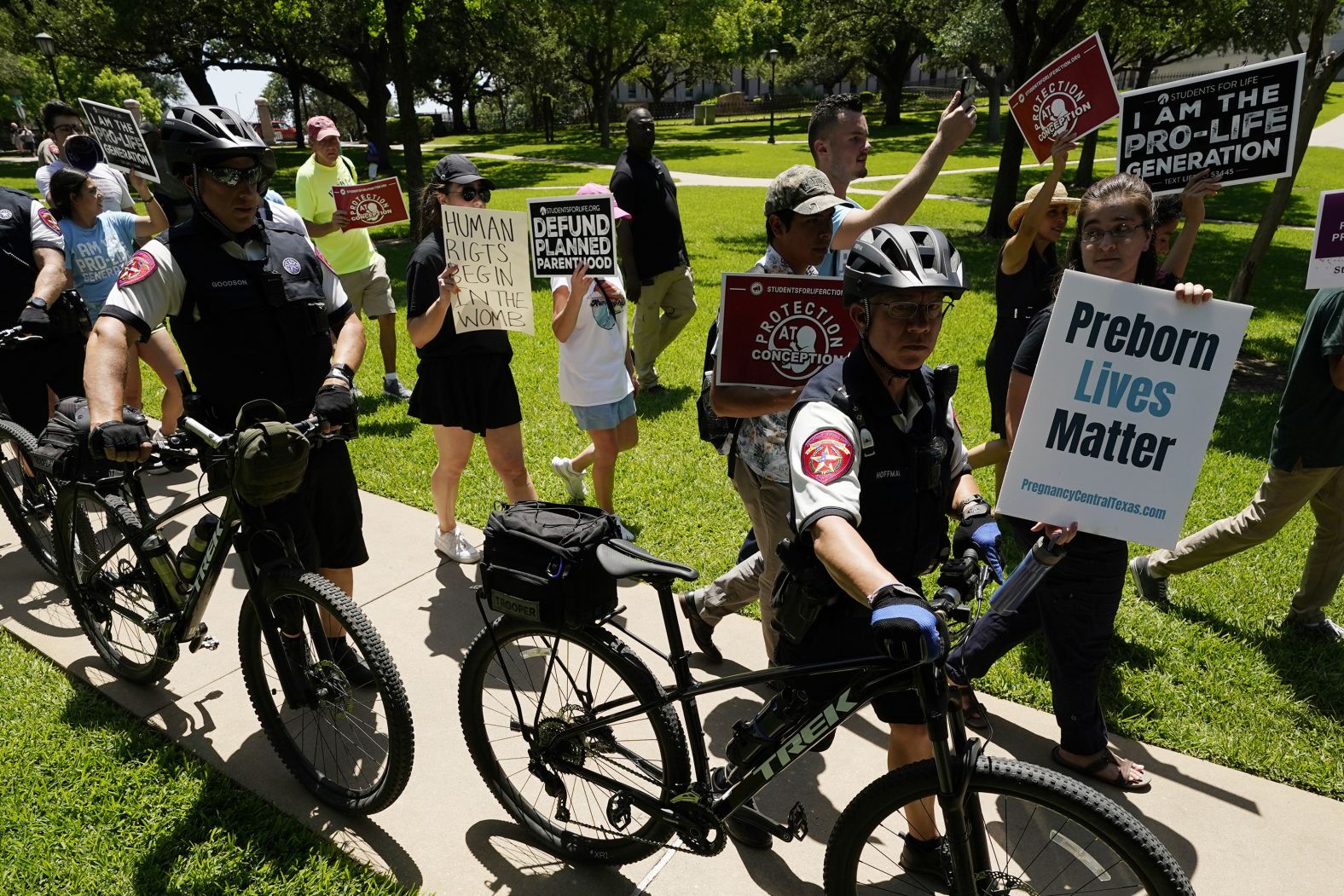 Anti-abortion demonstrators are separated from abortion rights demonstrators by state police during a rally at the Texas Capitol in Austin.