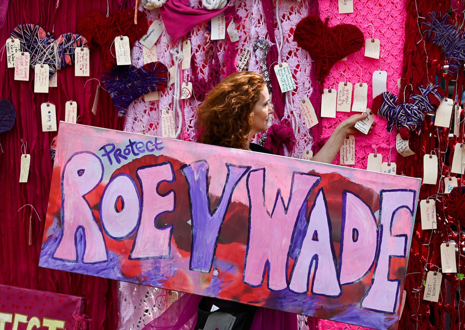 Jacqueline Von Edelbe holds a sign during an abortion rights rally in Chicago.
