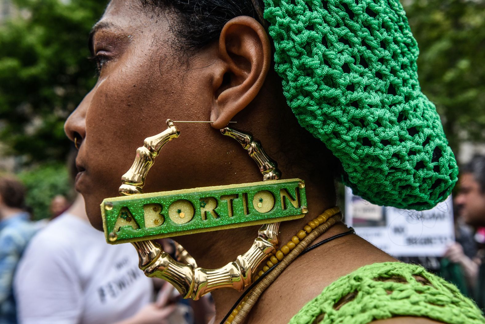 A person's earring is seen during an abortion rights march in New York City.