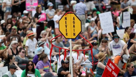 A homemade sign resembling a cloth hanger is seen as abortion rights protesters participate in nationwide demonstrations following the leaked Supreme Court opinion suggesting the possibility of overturning the Roe v. Wade abortion rights decision, in Atlanta, Georgia, U.S., May 14, 2022. REUTERS/Alyssa Pointer