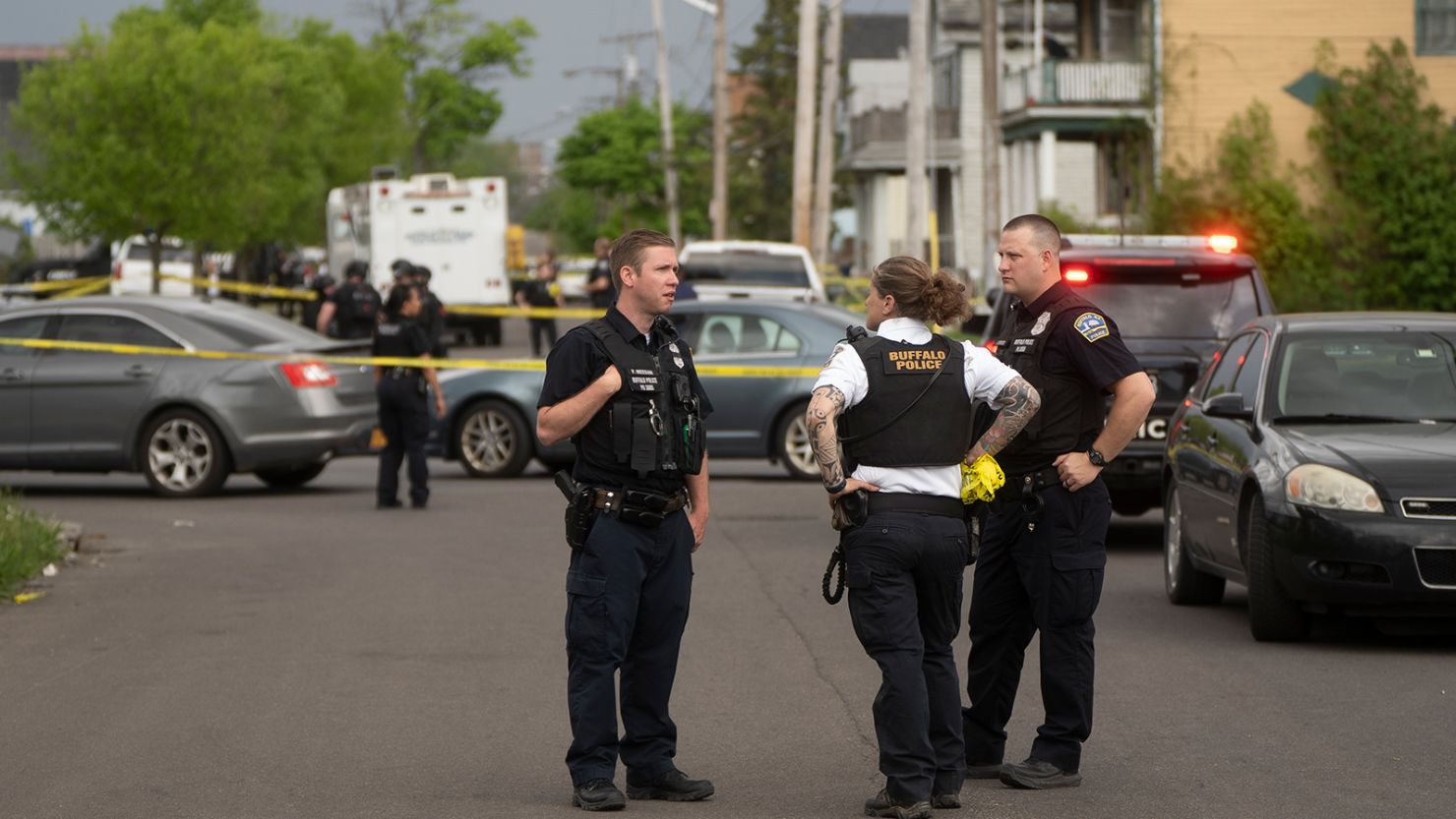 Police are posted on Riley Street after a shooter was taken into custody at the Tops Friendly Market in Buffalo, New York, on May 14, 2022. 