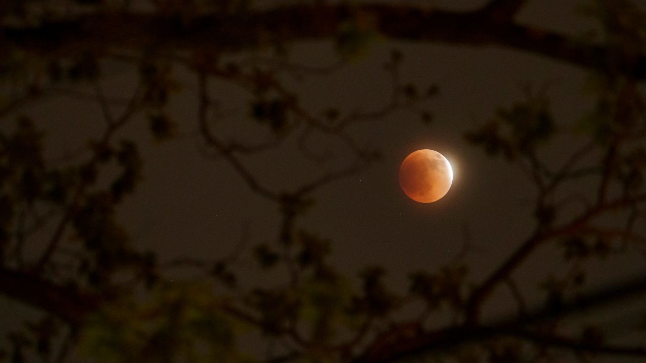 The moon was bathed in coppery light over Columbus, Ohio on Sunday.