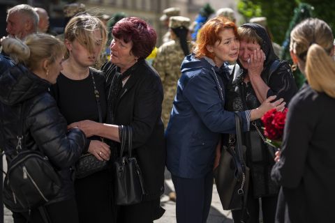 Grieving relatives attend the funeral of a Ukrainian military serviceman, Pankratov Oleksandr, 49, in Lviv, Ukraine, on May 14.