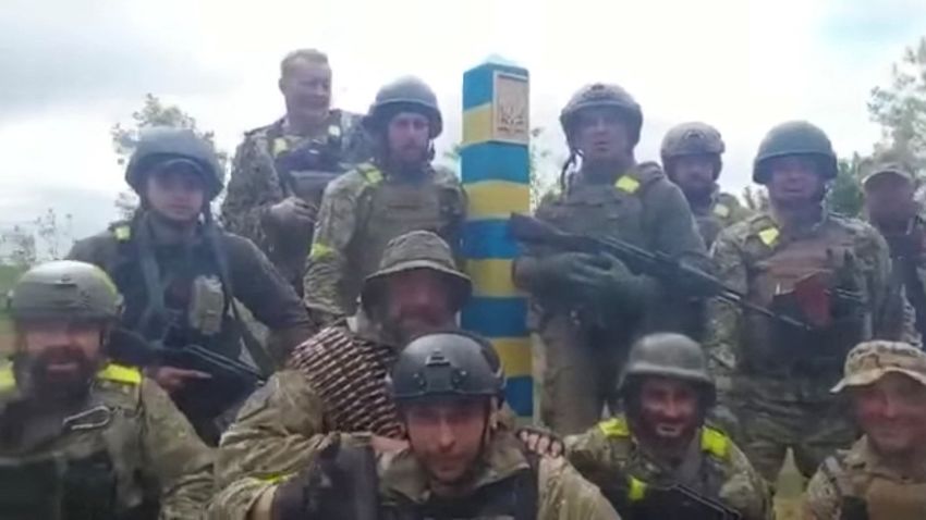 Ukrainian troops stand at the Ukraine-Russia border in what was said to be the Kharkiv region, Ukraine in this screen grab obtained from a video released on May 15, 2022. Ukrainian Ministry of Defence/Handout via REUTERS    THIS IMAGE HAS BEEN SUPPLIED BY A THIRD PARTY. MANDATORY CREDIT