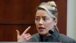 Actor Amber Heard testifies in the courtroom at the Fairfax County Circuit Courthouse in Fairfax, Virginia, on May 16, 2022. - Actor Johnny Depp sued his ex-wife Amber Heard for libel in Fairfax County Circuit Court after she wrote an op-ed piece in The Washington Post in 2018 referring to herself as a "public figure representing domestic abuse."