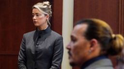 Actor Johnny Depp walks into the courtroom after a break at the Fairfax County Circuit Courthouse in Fairfax, Virginia, on May 16, 2022. - Actor Johnny Depp sued his ex-wife Amber Heard for libel in Fairfax County Circuit Court after she wrote an op-ed piece in The Washington Post in 2018 referring to herself as a "public figure representing domestic abuse." 