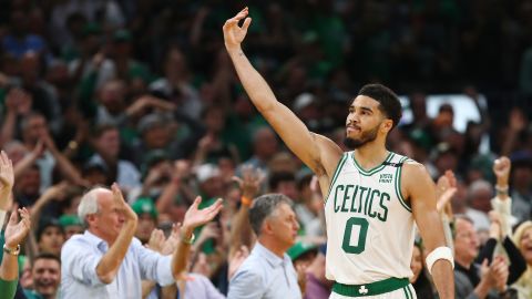 Tatum gestures to the crowd during the fourth quarter in Game 7 against the Milwaukee Bucks.