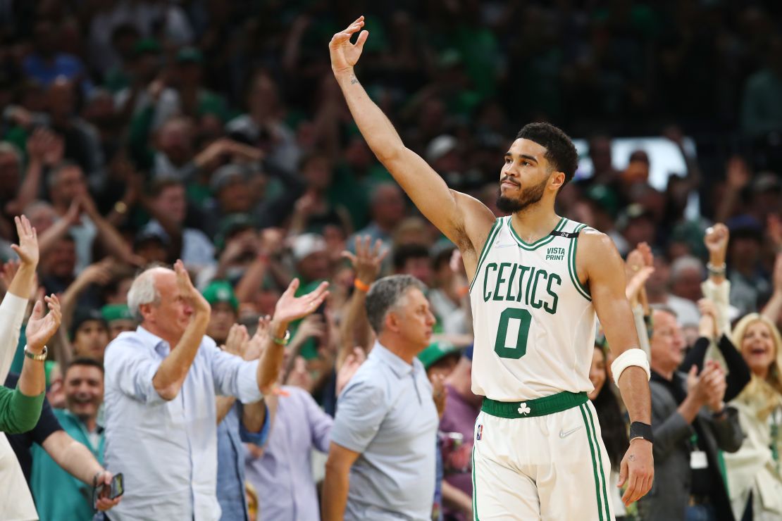 Tatum gestures to the crowd during the fourth quarter in Game 7 against the Milwaukee Bucks.