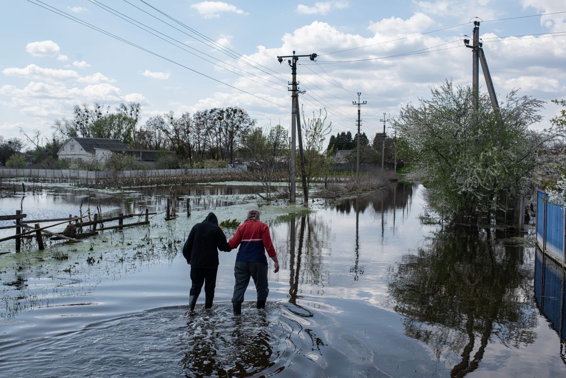 To keep Russian armored columns at bay, Ukrainian forces burst a dam near Demydiv, a village north of Kyiv.