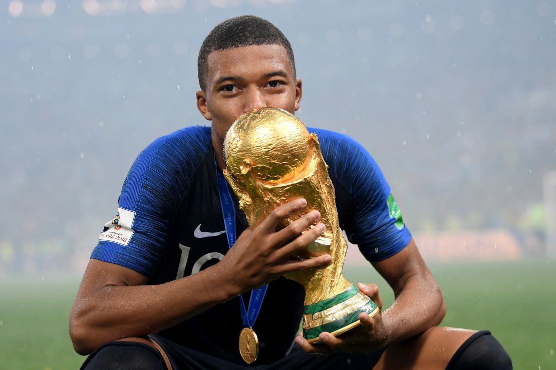 Mbappé celebrates after France wins the 2018 World Cup.