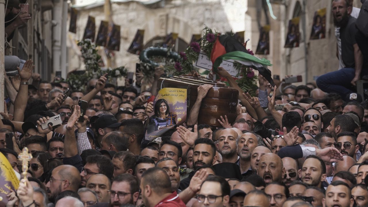 Mourners carrying the casket of Shireen Abu Akleh on Friday.