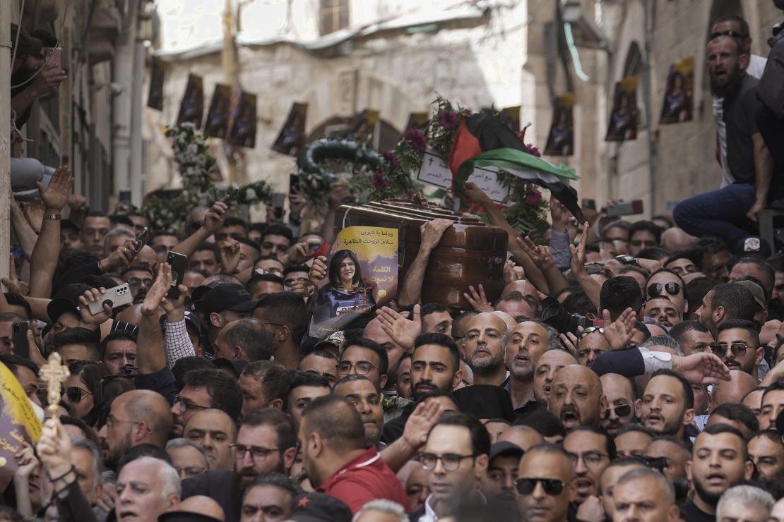Mourners carrying the casket of Shireen Abu Akleh on Friday.
