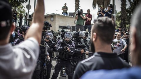 Israeli border police pictured during the funeral on Friday.