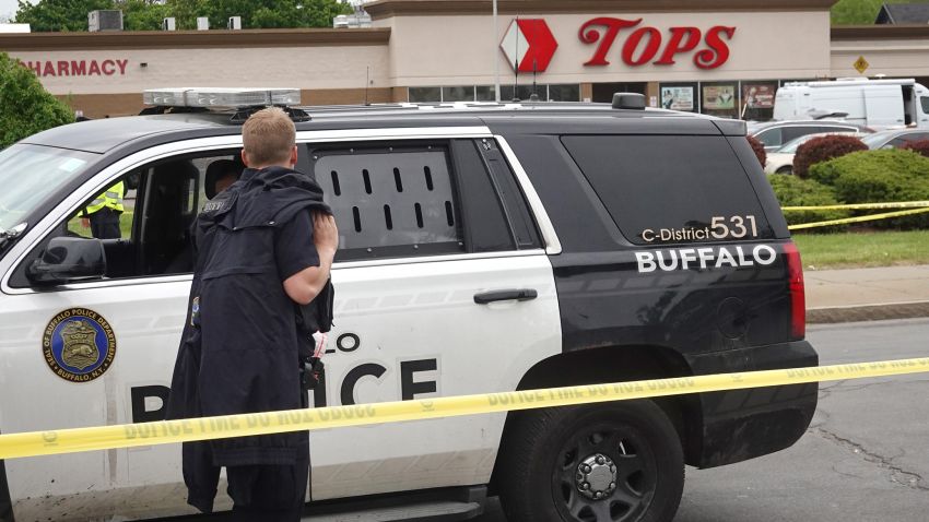 BUFFALO, NEW YORK - MAY 16: Police and FBI agents continue their investigation of the shooting at Tops Market on May 16, 2022 in Buffalo, New York. A gunman opened fire at the store yesterday killing ten people and wounding another three. The attack was believed to be motivated by racial hatred.  (Photo by Scott Olson/Getty Images)