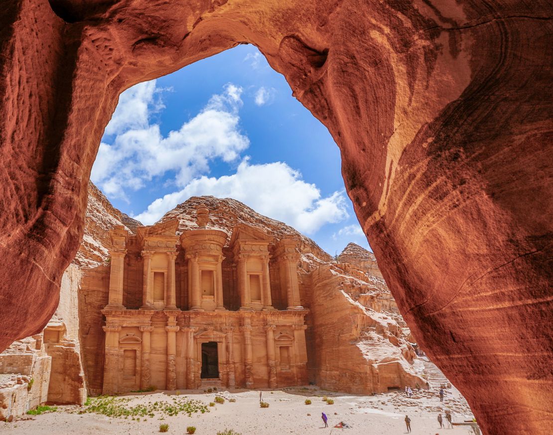 The Treasury is seen through a cave opening at Petra in Jordan. The Arab nation is now at the CDC's Level 1.