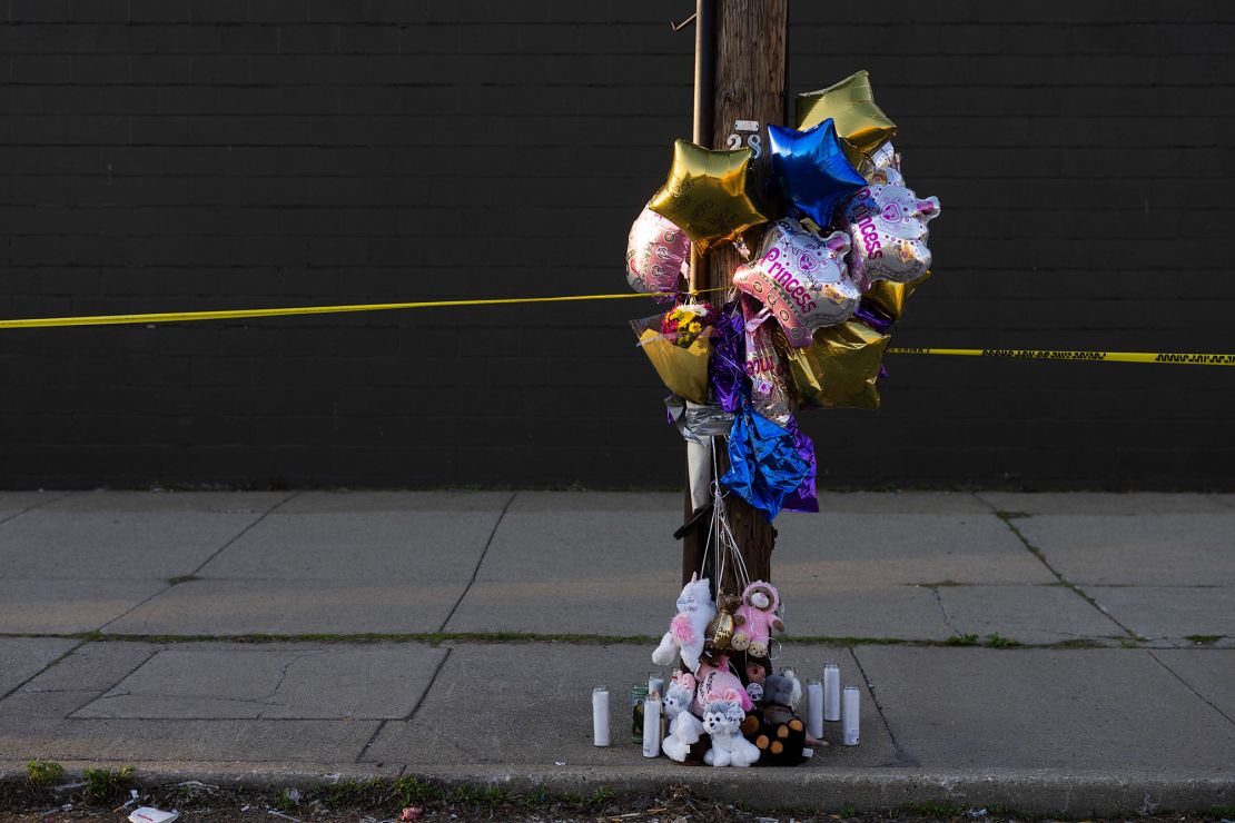 A memorial is set up near Tops.