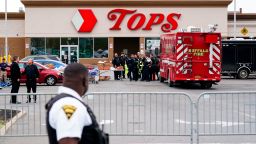 Investigators work the scene of a shooting at a supermarket, in Buffalo, N.Y., Monday, May 16, 2022. 