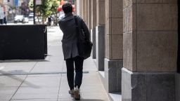 A pedestrian in the financial district of San Francisco, California, U.S., on Monday, May 9, 2022. 