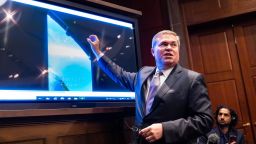 Deputy Director of Naval Intelligence Scott Bray plays a video of an 'unidentified aerial phenomena,' commonly referred to as UFOs, during a hearing before a subcommittee of the House Intelligence Committee on the phenomena in the US Capitol in Washington, DC, on May 17, 2022. It is the first public hearing on UFOs on Capitol Hill since the 1960s.
