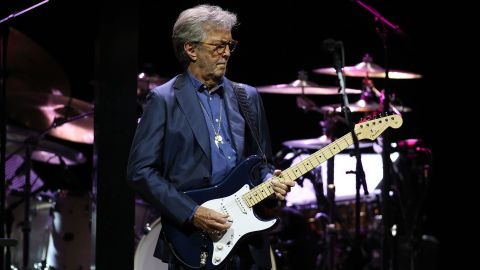 Eric Clapton, pictured performing at Royal Albert Hall earlier this month, tested positive for Covid-19 and had to postpone some tour dates. He previously expressed skepticism toward Covid-19 vaccine mandates and lockdowns.