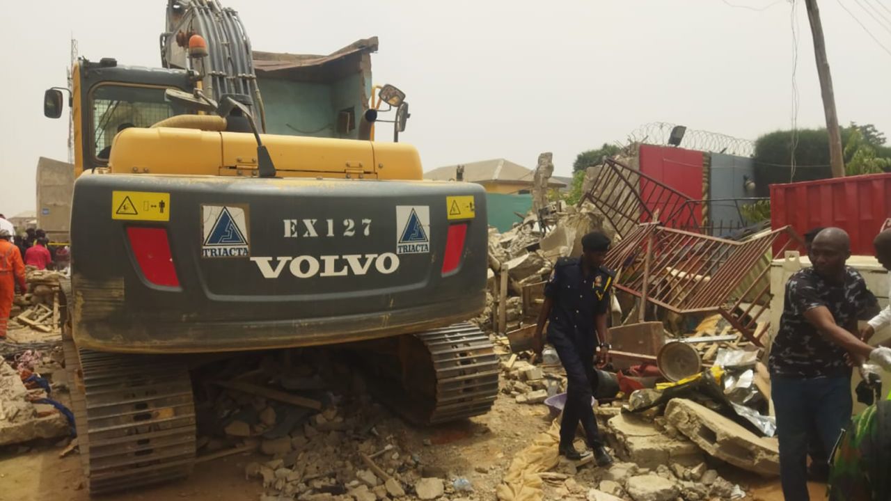 Rescue teams search for survivors of a gas blast in Nigeria's Kano State on May 17, 2022.