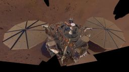 This is NASA InSight's second full selfie on Mars. Since taking its first selfie, the lander has removed its heat probe and seismometer from its deck, placing them on the Martian surface; a thin coating of dust now covers the spacecraft as well.

This selfie is a mosaic made up of 14 images taken on March 15 and April 11 — the 106th and 133rd Martian days, or sols, of the mission — by InSight's Instrument Deployment Camera, located on its robotic arm.