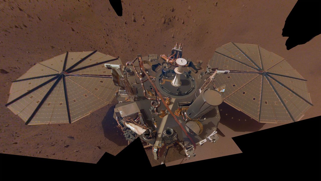 A selfie captured by InSight shows a buildup of dust on its solar panels in 2019.