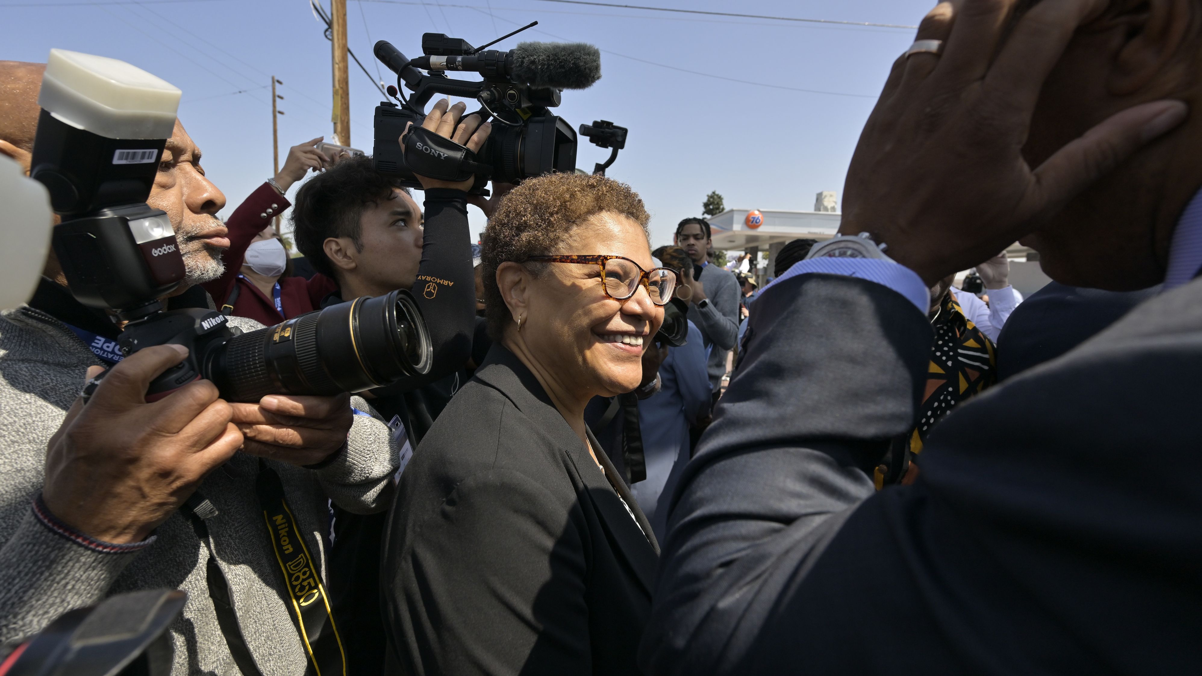 Karen Bass arrives at a press conference recognizing the 30th anniversary of the L.A. Riots at the corner of Florence Avenue and Normandie Avenue in Los Angeles, on Friday, April 29, 2022. 