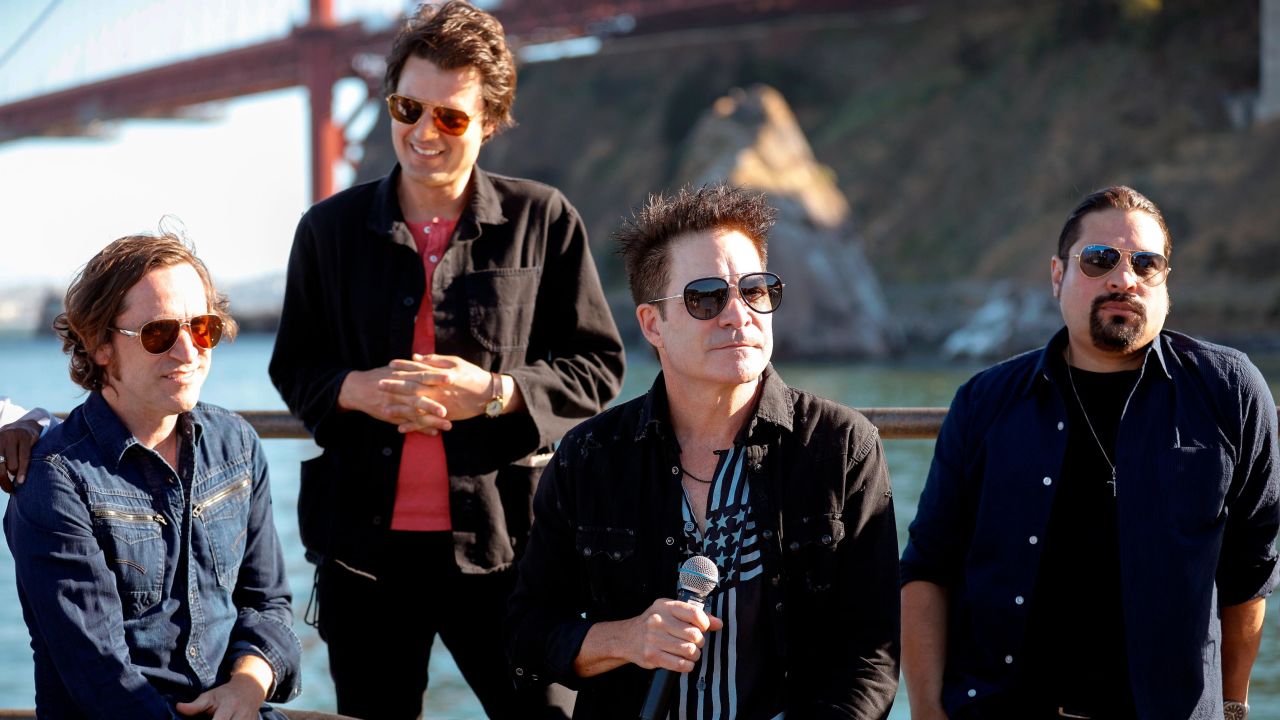(From left) Jerry Becker, Taylor Locke, Pat Monahan, and Hector Maldonado, of multi-Grammy Award-winning band Train, perform onstage in San Francisco for "A Capitol Fourth" in 2021.
