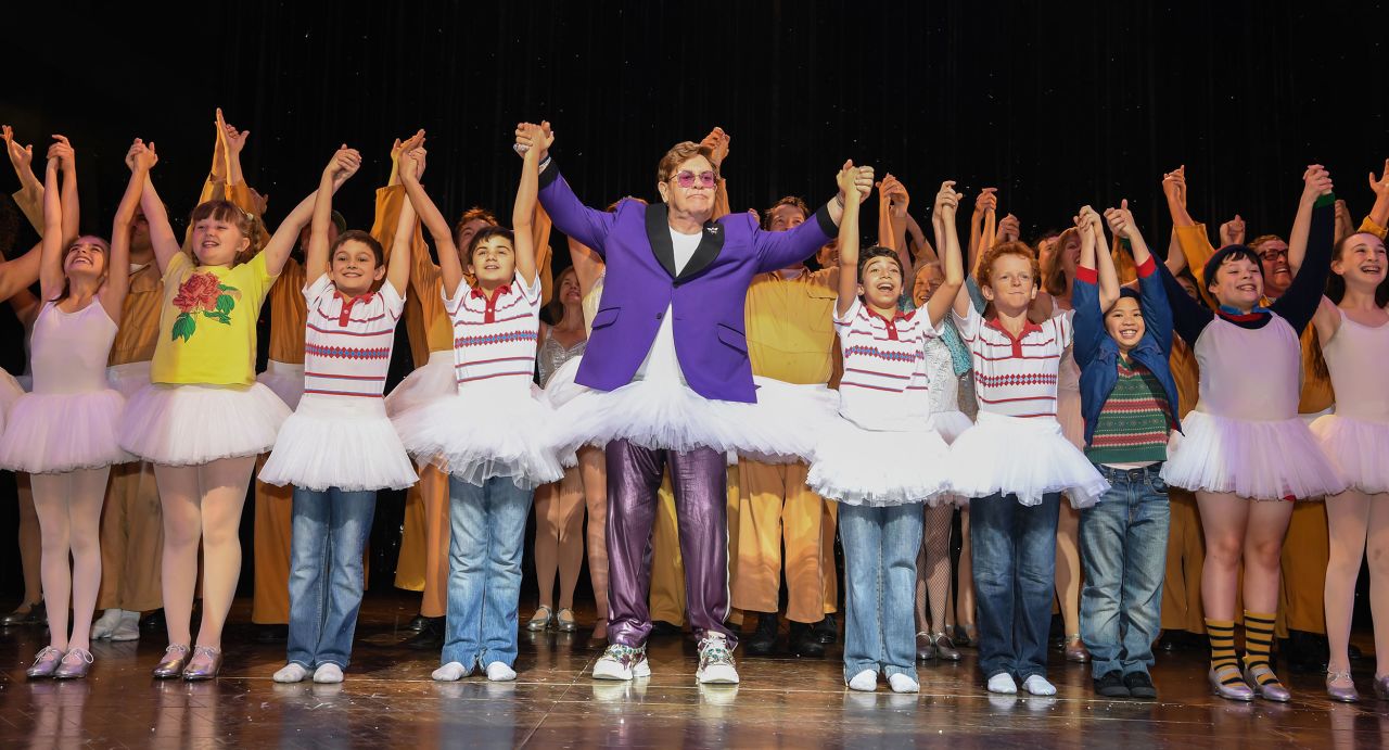 John makes a surprise curtain call appearance in Sydney as he visits the cast of "Billy Elliot: The Musical" in November 2019. John did the music for the production.