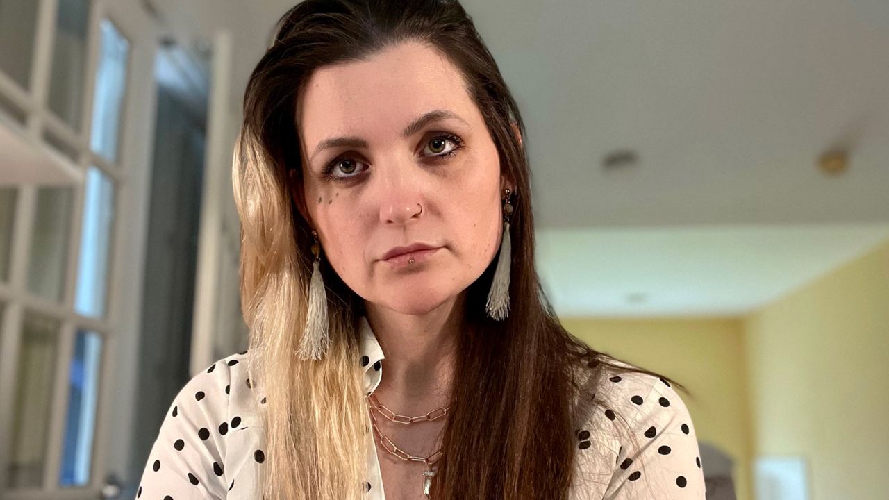 Cher Scarlett, a software engineer, told CNN Business in an interview: "I'm looking at these pictures, and all I can think is that somebody has photoshopped my face onto porn."