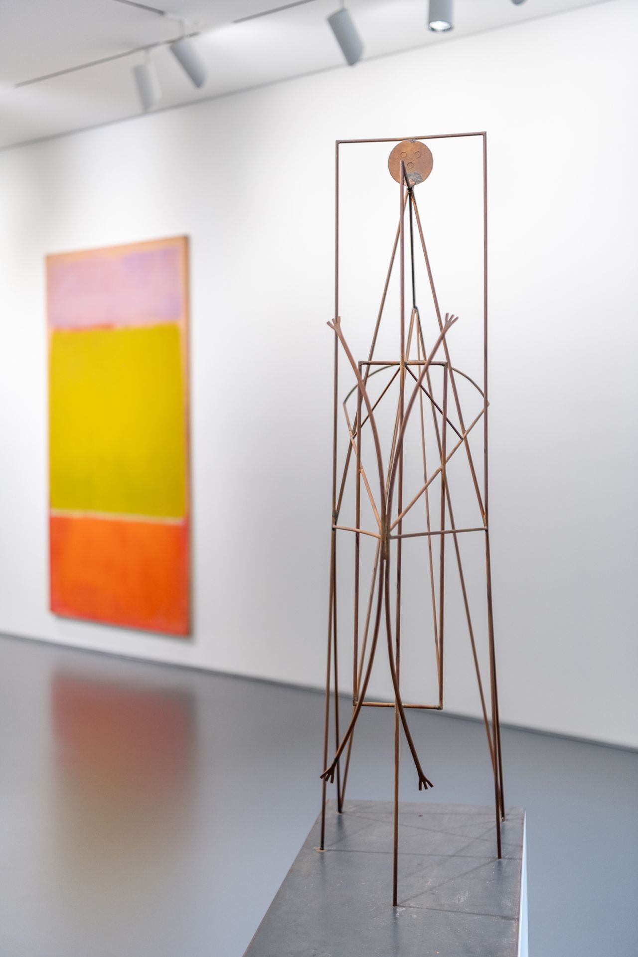 Mark Rothko's painting "No. 7" (left), which sold for $82.5 million, and Pablo Picasso's sculpture "Figure" (right), which exceeded estimates to fetch $26.3 million in the first auction.