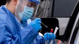 Mandatory Credit: Photo by MICHAEL REYNOLDS/EPA-EFE/Shutterstock (12759842b)
Polymerase chain reaction (PCR) tests for Covid-19 that involve mouth and nasal swabbing are admimistered at a drive-thru testing site in Baltimore, Maryland, USA, 13 January 2022. The US President has said, 13 January, that the United States will obtain 500 million more Covid-19 tests on top of plans to order 500 million already announced last month.
Covid-19 testing in Baltimore, Maryland, USA - 13 Jan 2022